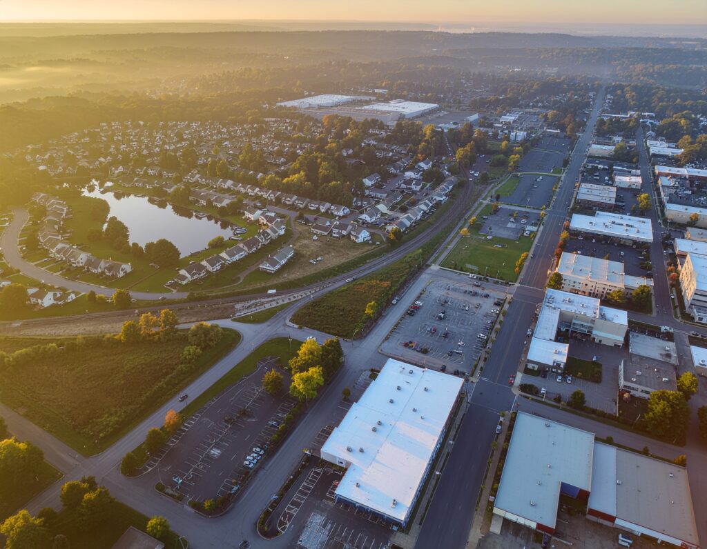 firefly a stunning, wide angle aerial photograph at sunrise showcasing the diverse landscape 237884