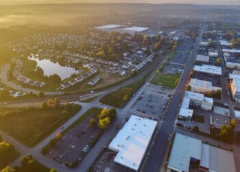 firefly a stunning, wide angle aerial photograph at sunrise showcasing the diverse landscape 237884