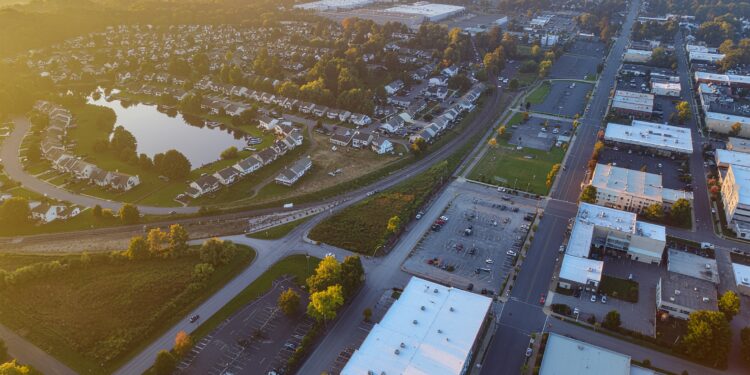 firefly a stunning, wide angle aerial photograph at sunrise showcasing the diverse landscape 237884