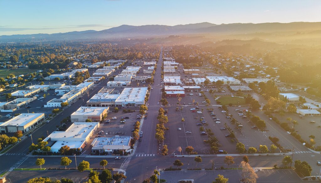 firefly clean aerial view of downtown gilroy commercial district, warm daylight, small city g 896600