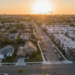 firefly gemini flash a realistic aerial view of a california neighborhood transitioning from single family 775402
