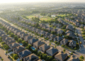 firefly gemini flash aerial view of a busy suburban neighborhood, morning sunlight, realistic detail, cris 845269
